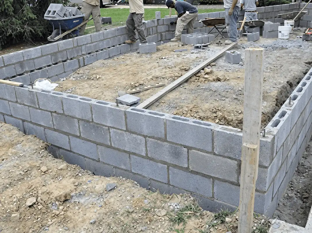 Professionals building a foundation with blocks in Yonkers, NY