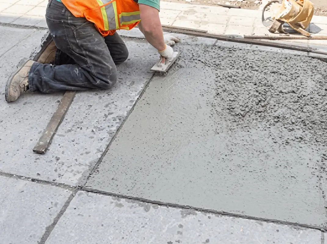 Professional repairing a concrete floor in Yonkers, NY