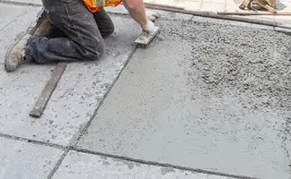 Professional repairing a concrete floor in Yonkers, NY