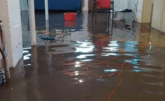 Basement with boiler, cabinets and washing machine completely flooded in Yonkers, NY