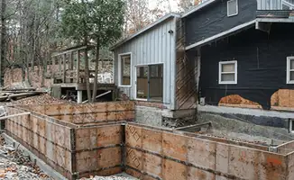 Prepared site with foundation forms for home remodeling and addition project in Yonkers, NY
